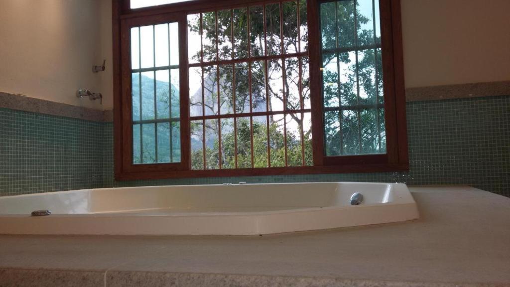 Quarto de flat com vista para Pedra Azul Exterior foto